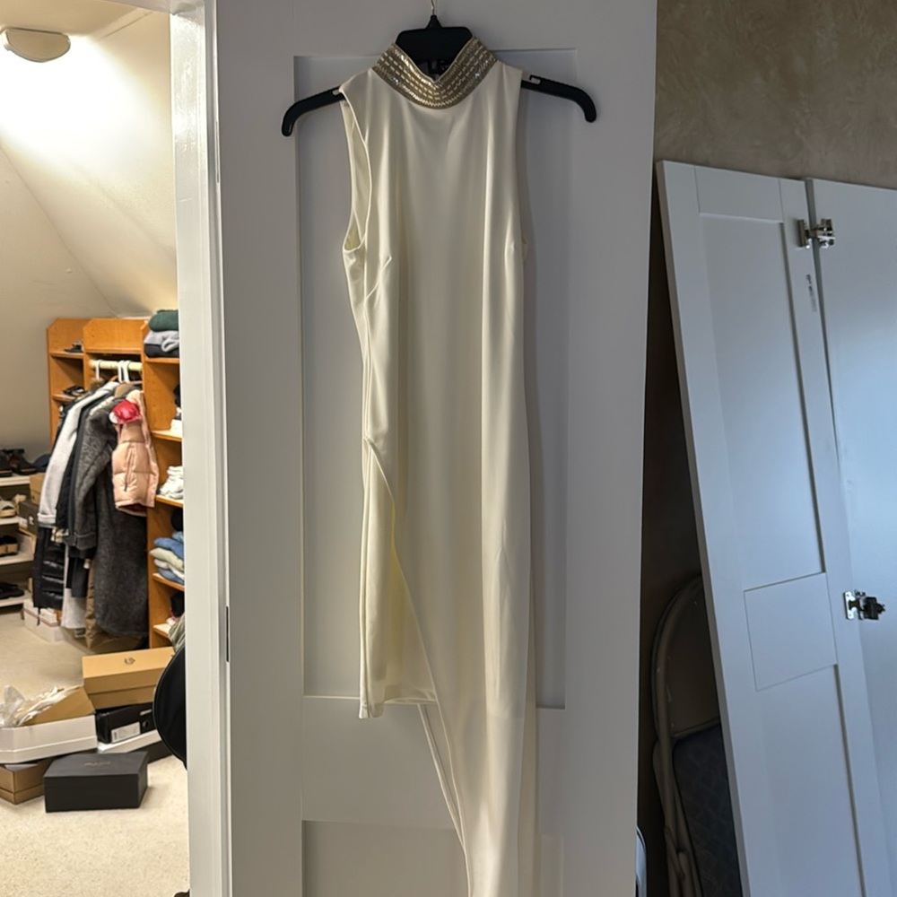 Bebe midi strapless dress with embellished gold neckline.